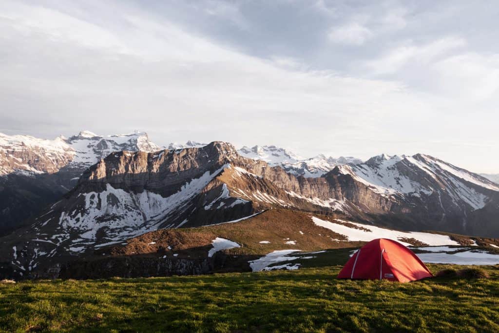 Tent infront of snowy mountain