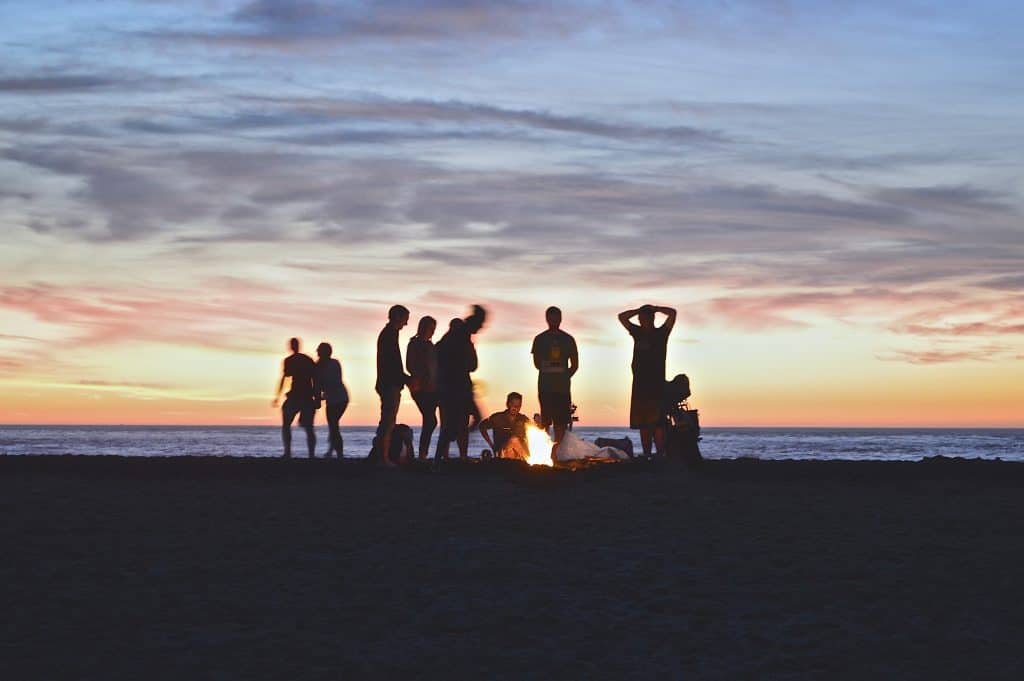 People Gathering At A Campfire