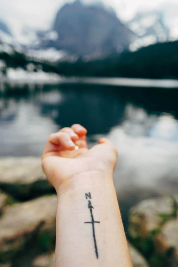 Simple North Direction Tattooed on Someone's Hand